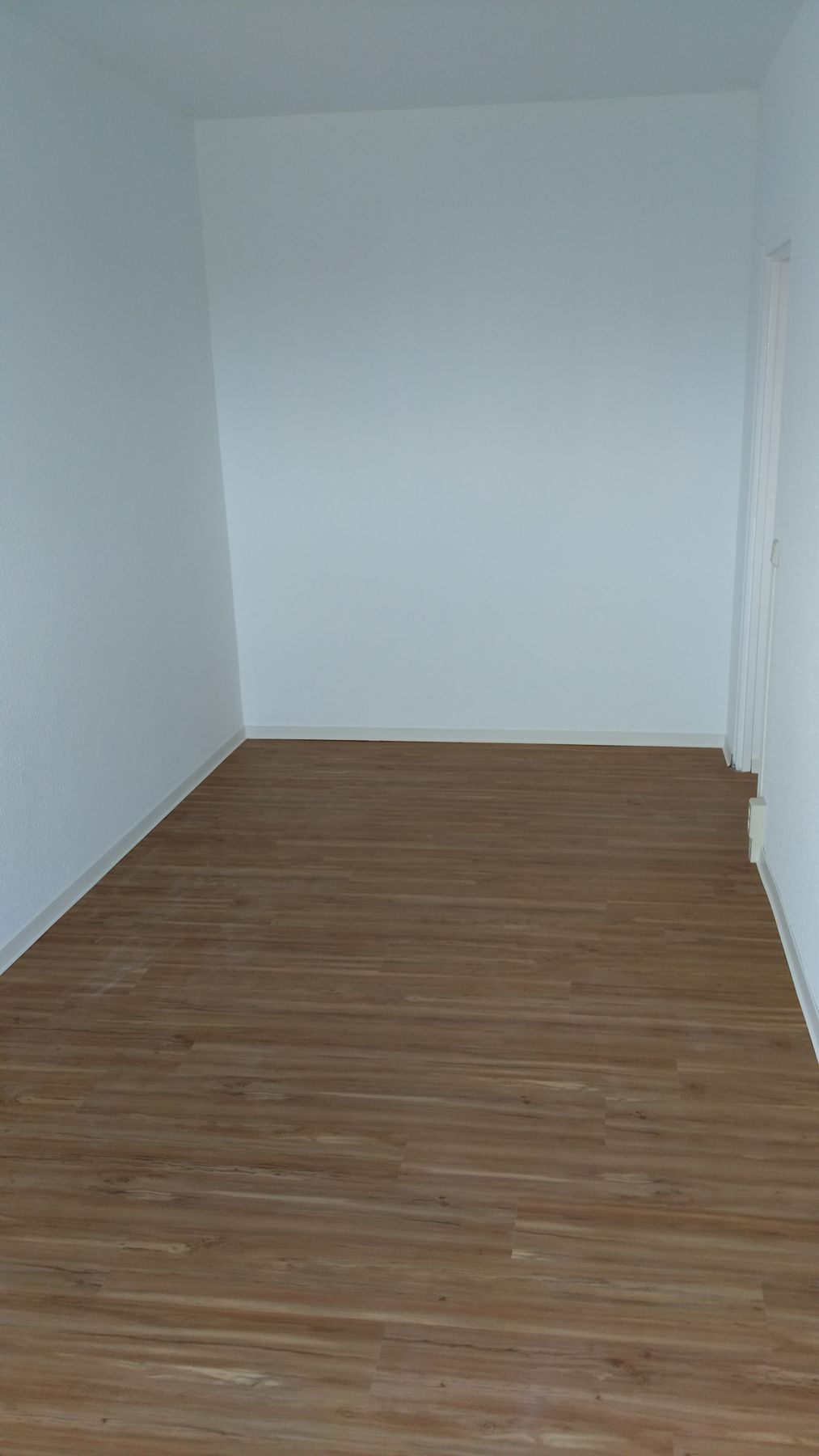 Fertig verlegter Designbelag im Zimmer