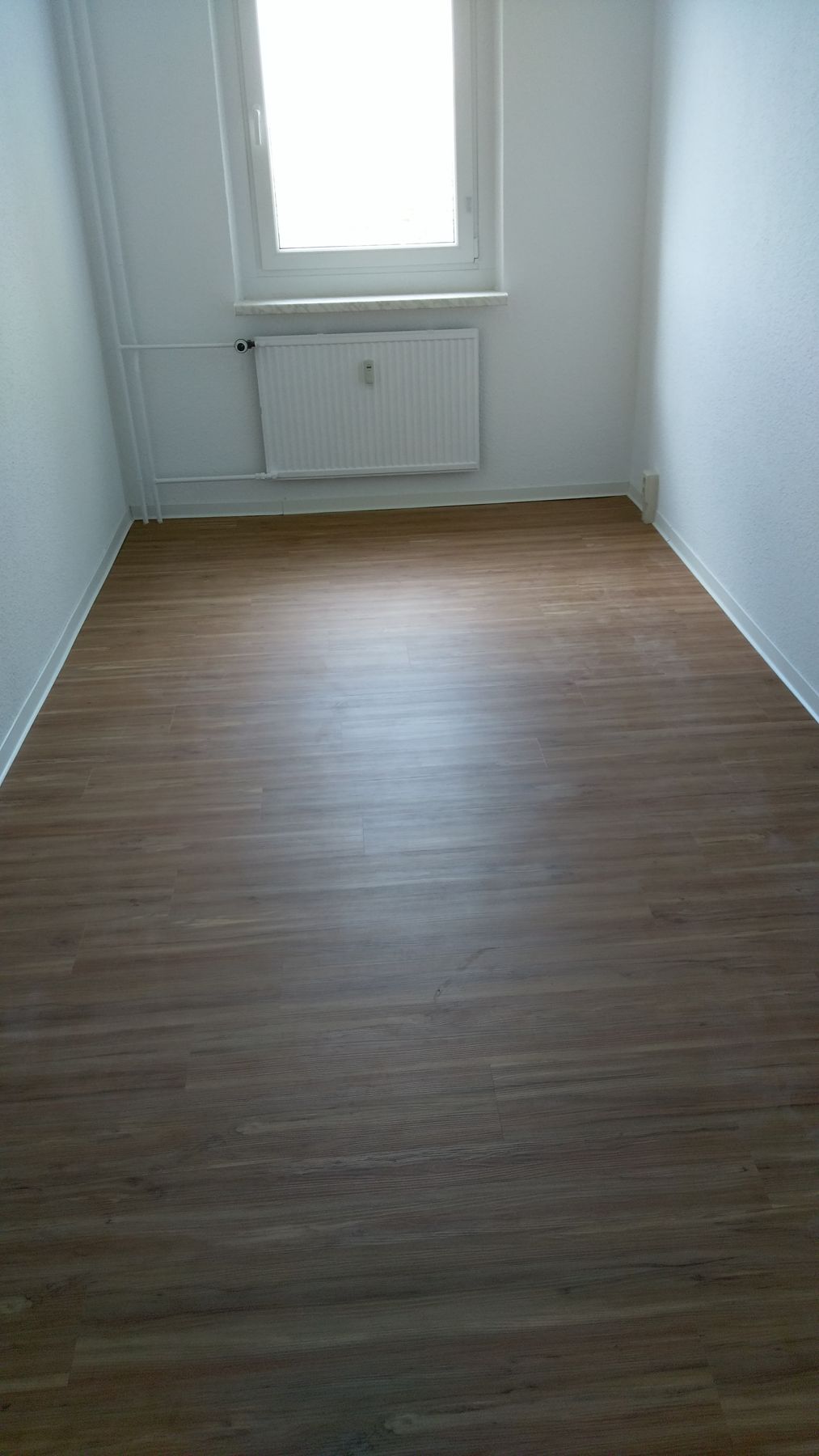 Renovierter Raum mit neuem Boden