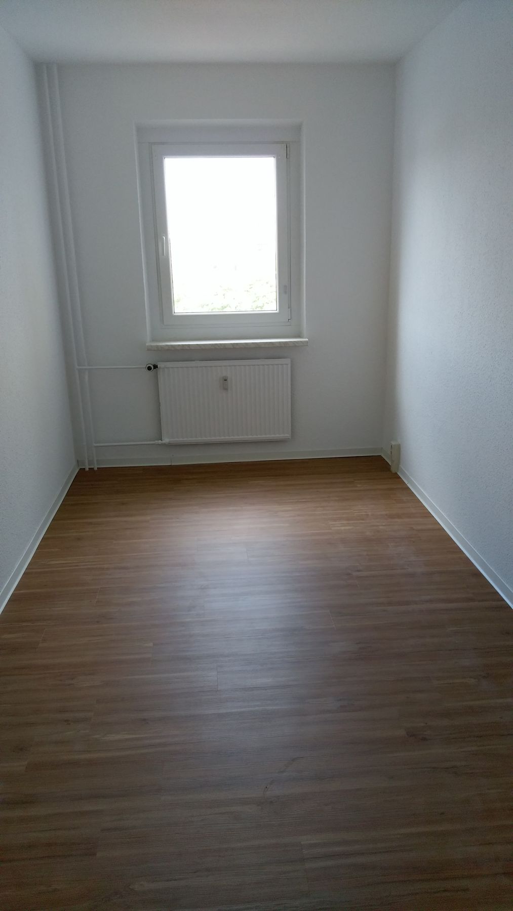 Fertiggestellter Wohnraum mit Designboden